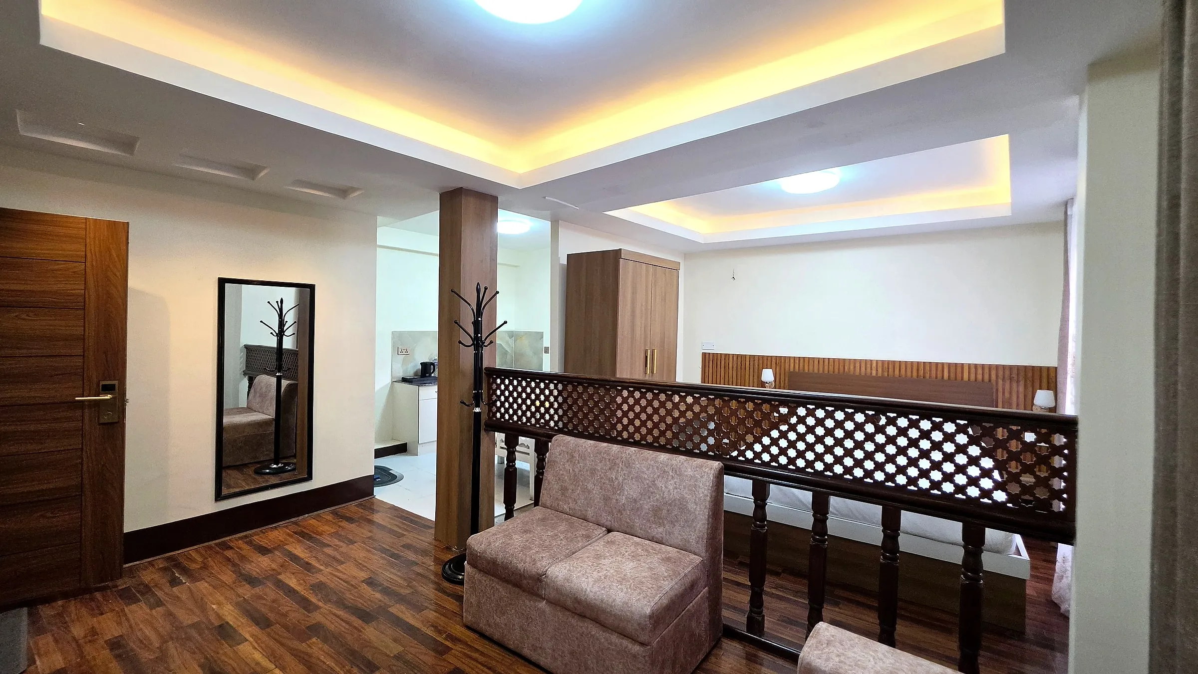 Living area with wooden floors and seating