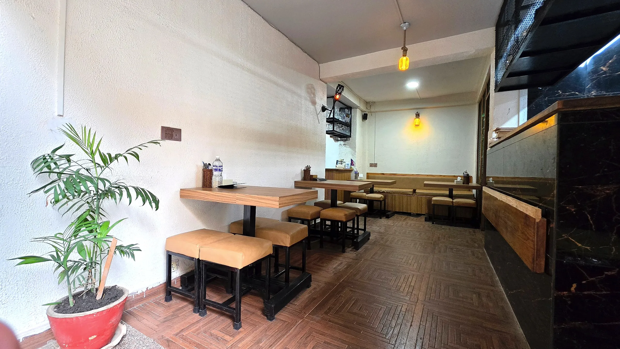 Cozy cafe corner with bench seating